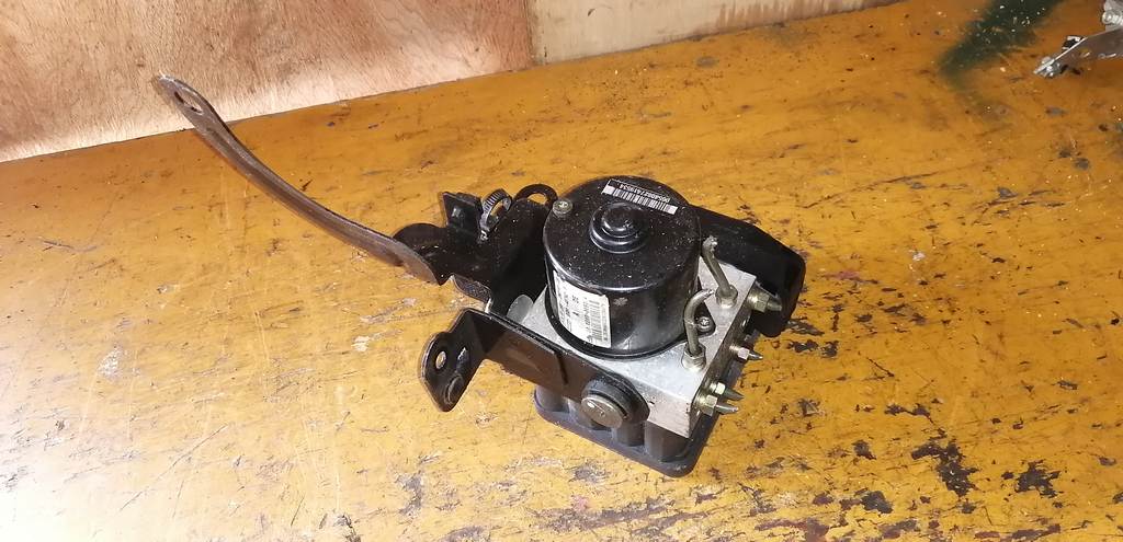 блок abs Mazda Demio 3