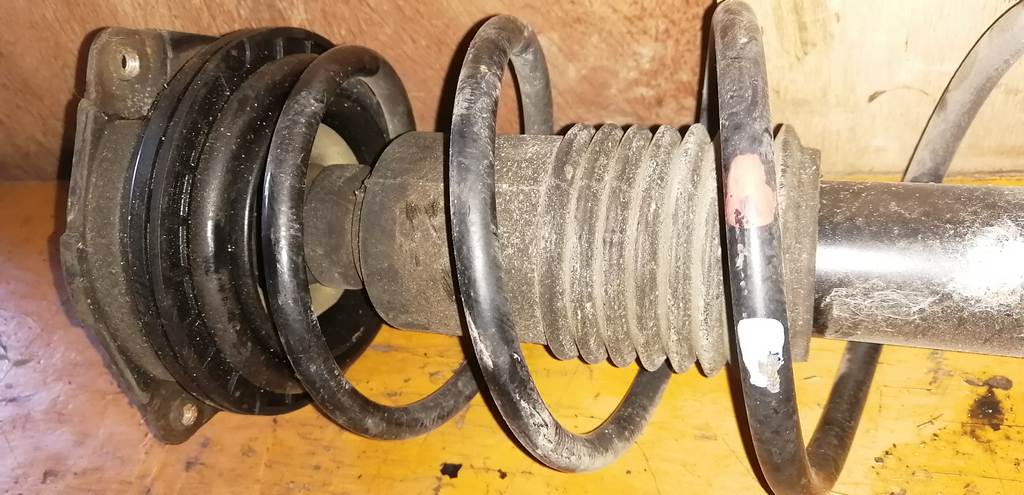 стойка Nissan March 3