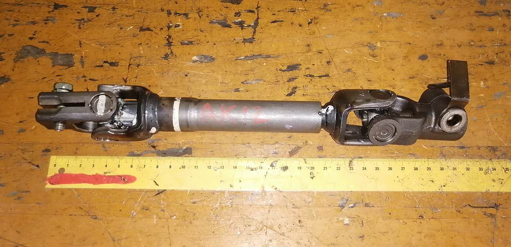 рулевой карданчик Nissan March 0