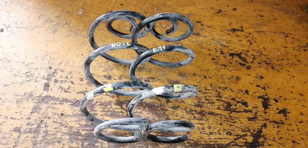 пружина Nissan Note 0