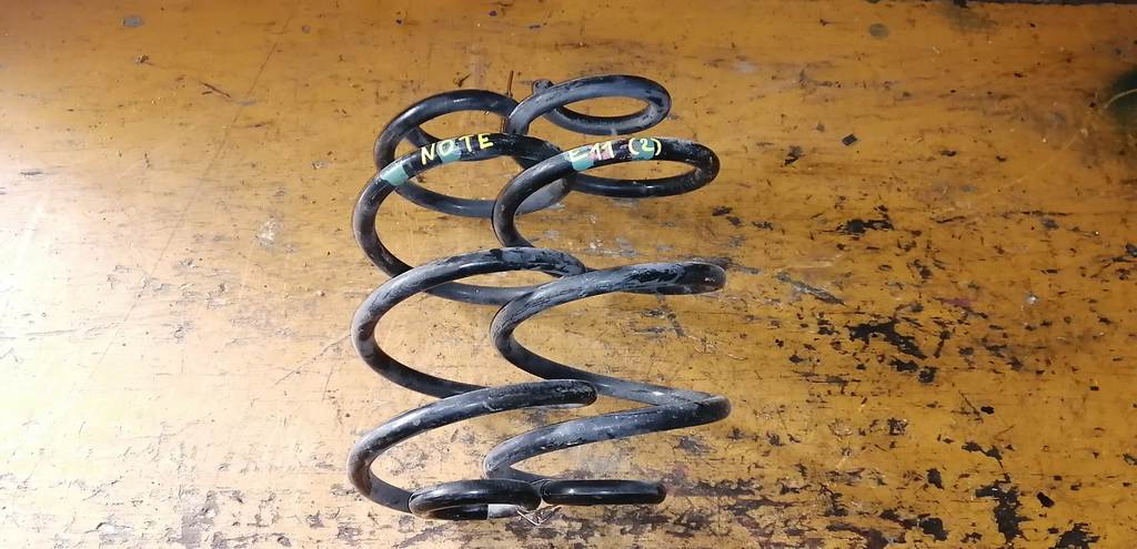 пружина Nissan Note 0