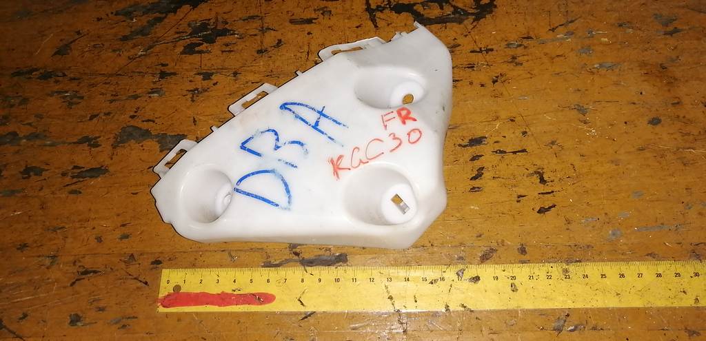 крепеж бампера Toyota Passo 0