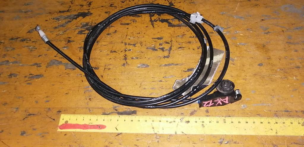 тросик лючка бака Nissan March 0