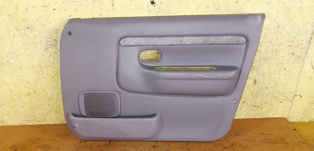 обшивка дверей Mazda Demio 0