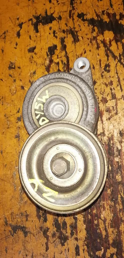 натяжитель приводного ремня Mazda Demio 0