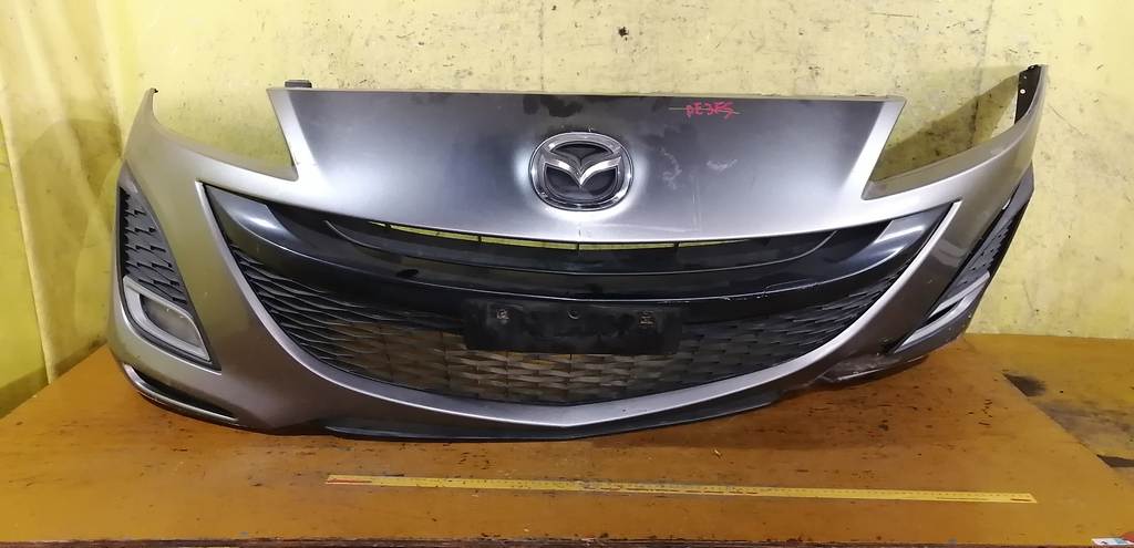 бампер Mazda Axela 0