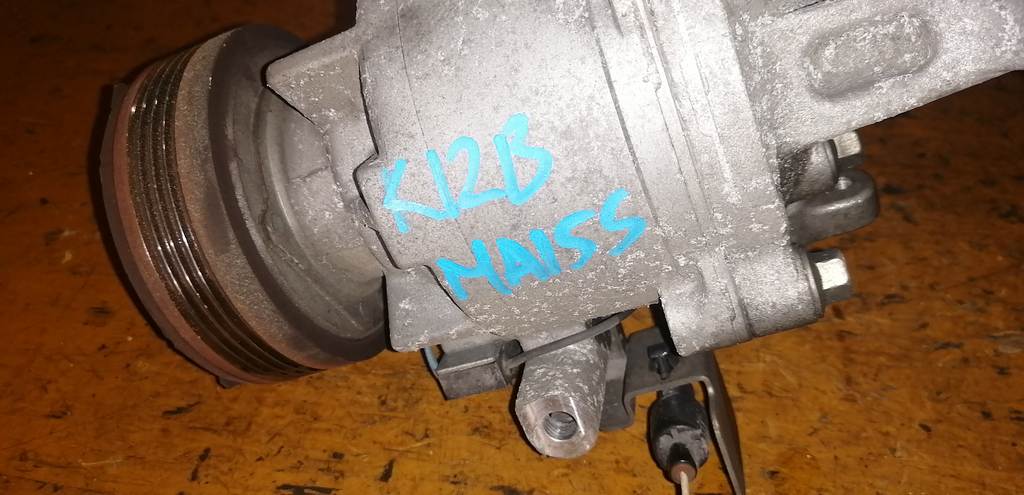 K12B КОМПРЕССОР КОНДИЦИОНЕРА 95201-68LA1 Suzuki Solio 1