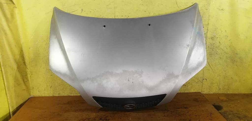 капот Mazda Demio 0