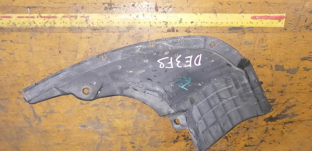 подкрылок Mazda Demio 0