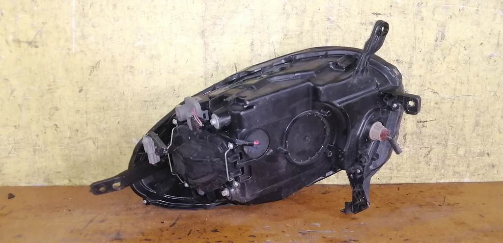 фара Nissan March 3