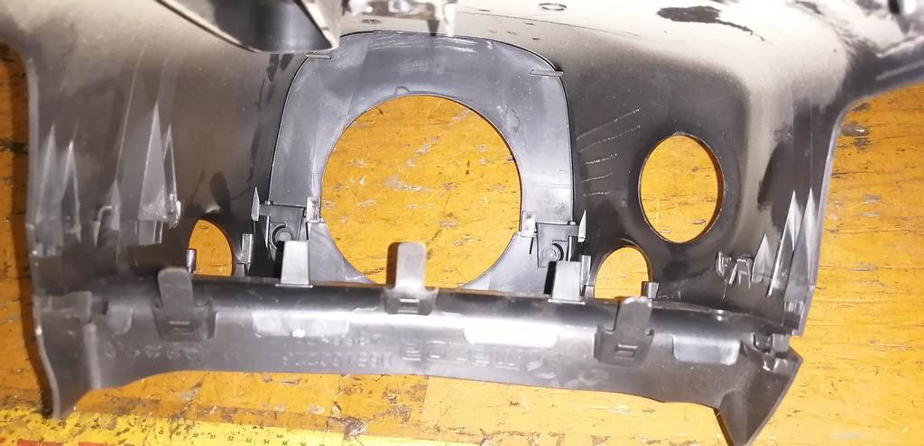 кожух рулевой колонки Mazda Demio 3