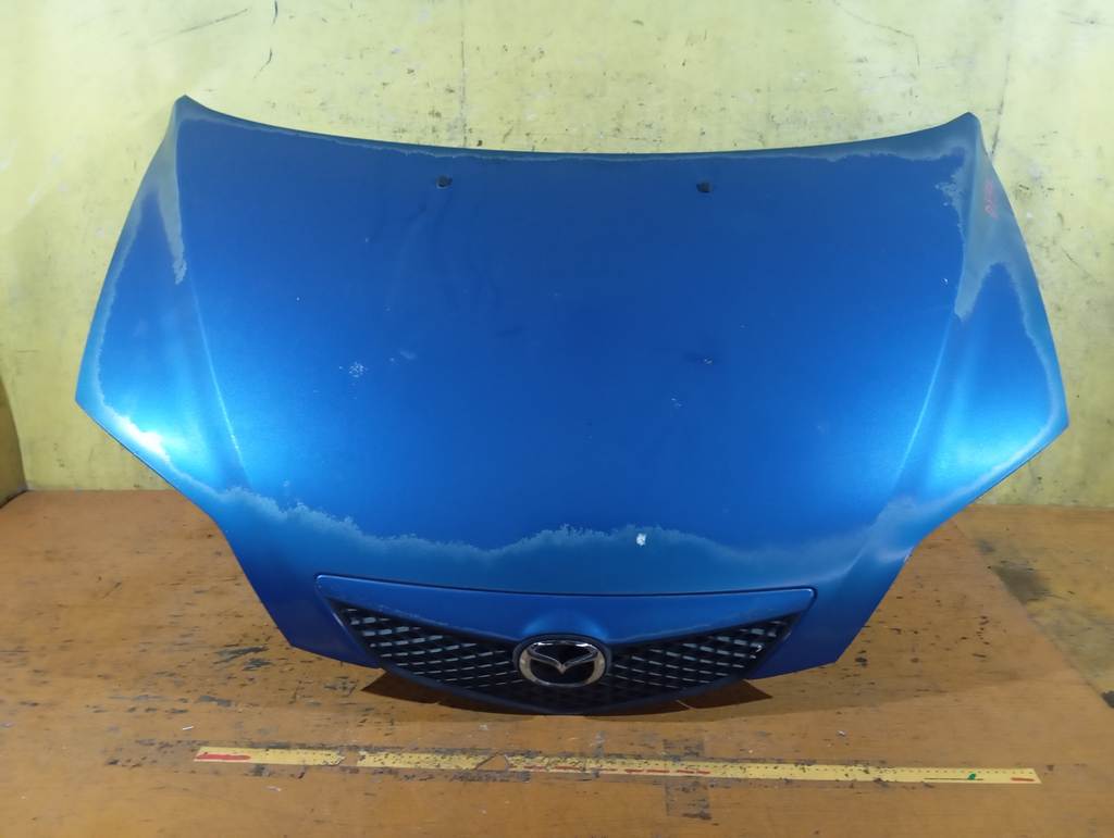капот Mazda Demio 0
