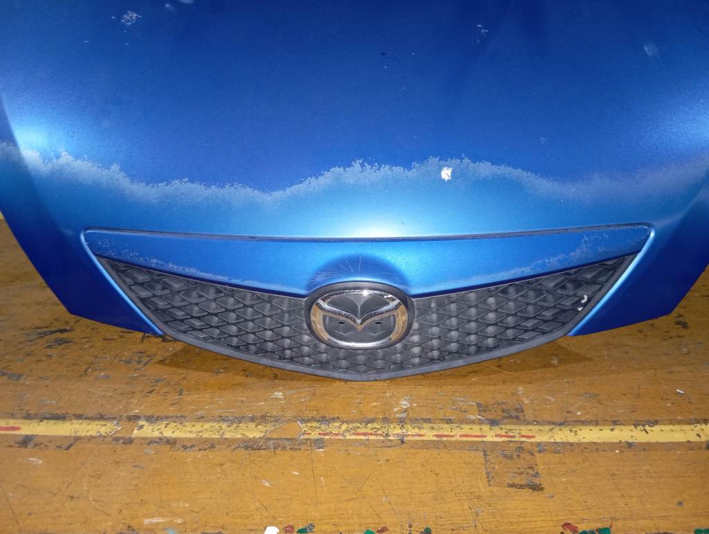 капот Mazda Demio 3